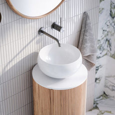 Bao Classic round gloss white basin on Ingrain fluted powder room vanity