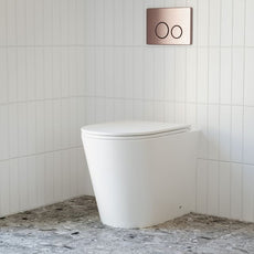 Bao Elegant Matte White Rimless Toilet Suite with behind the wall cistern featuring Nero flush plate and buttons in Brushed Bronze