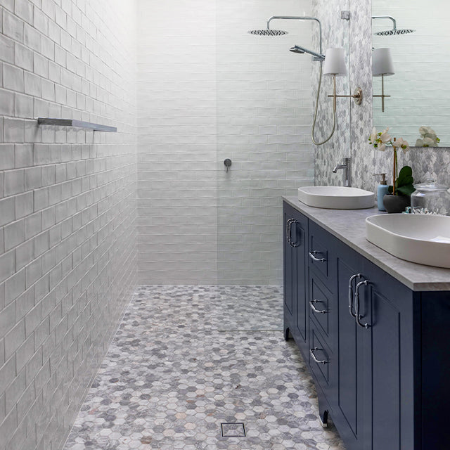 Turramurra x the blue space - white wavy subway tile, timberline navy blue heritage vanity, chrome caroma taps, grey feature tiles