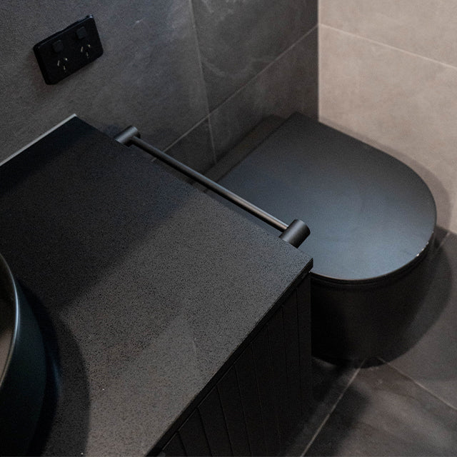 Image includes ADP Ashley Wall Hung Vanity - Centre Bowl, Black Poly Matte, Jet Black Caesar, 1 Tap 12 Oclock, Margot MB, Phoenix Vivid Slimline Hand Towel Rail Matte Black, Studio Bagno Milady Rimless Wall Faced Toilet with Geberit Sigma In-Wall Cistern